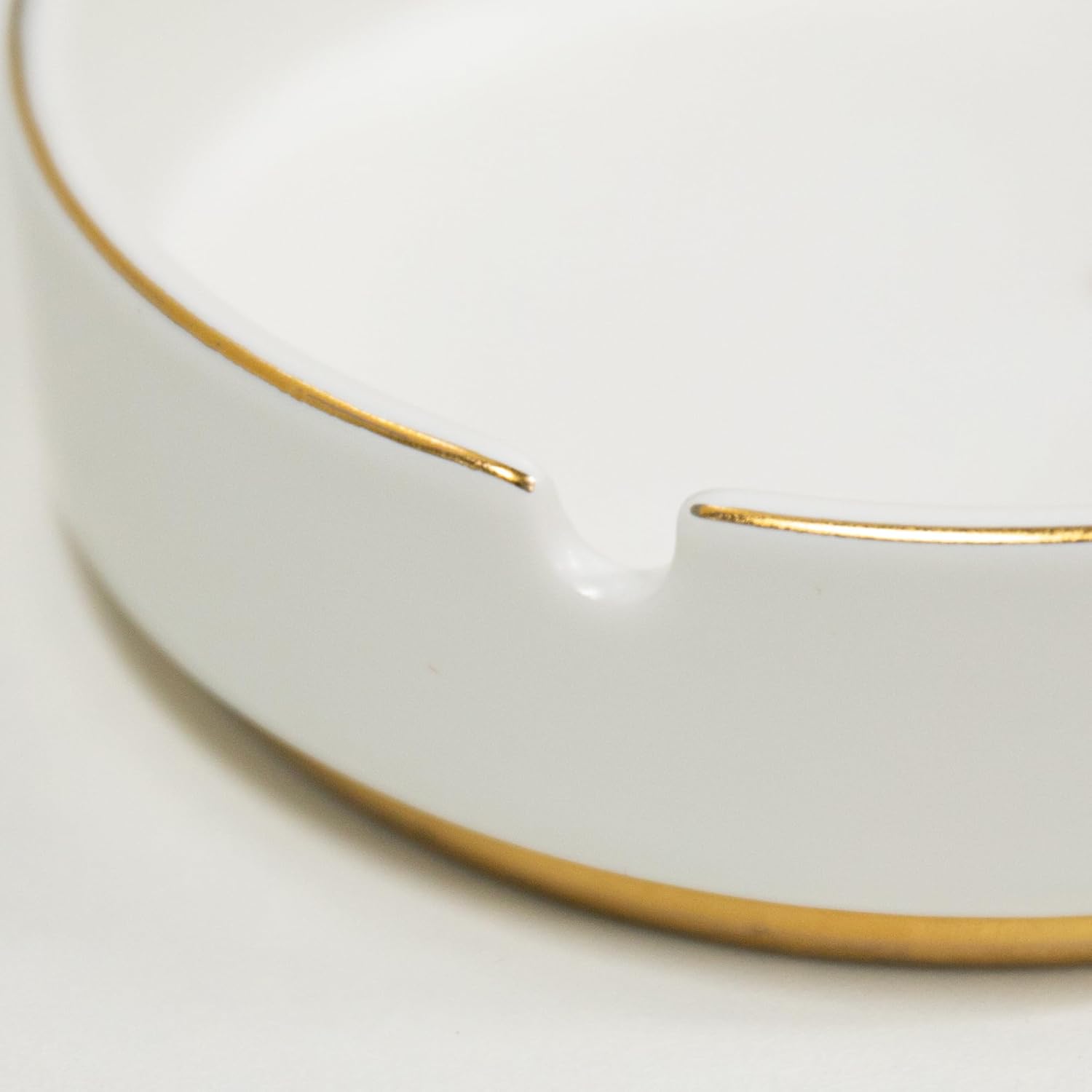 Luxurious Ceramic Ashtray with Gold Edging and Embossed Gold Lettering