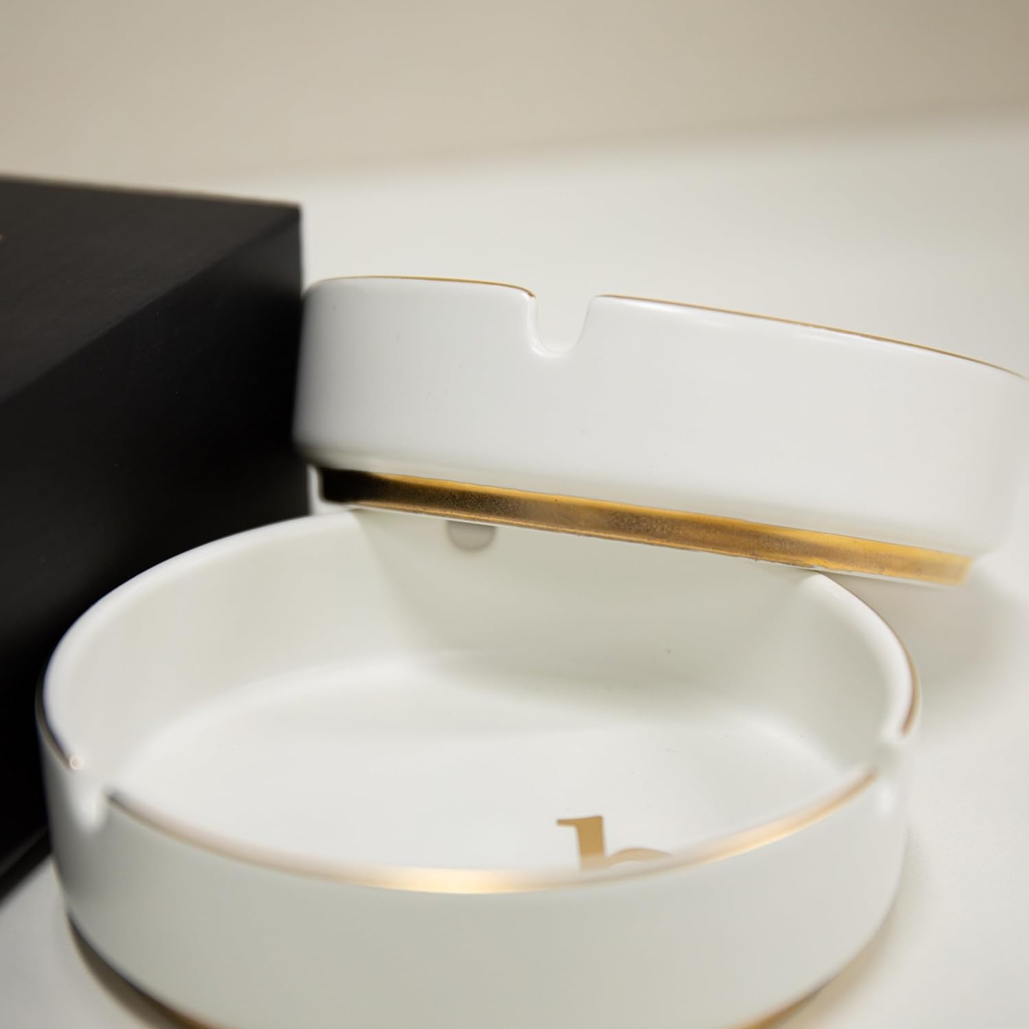 Luxurious Ceramic Ashtray with Gold Edging and Embossed Gold Lettering