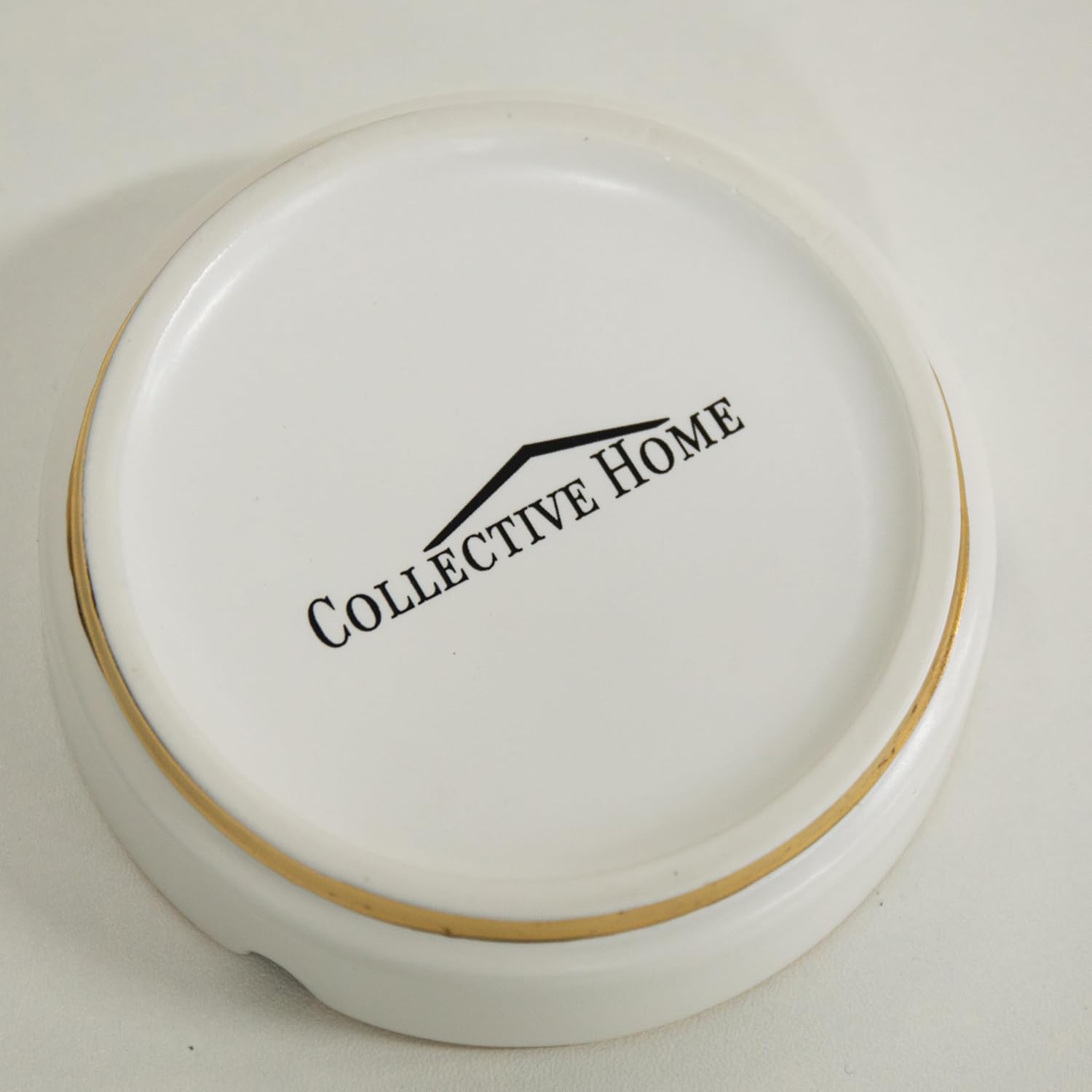 Luxurious Ceramic Ashtray with Gold Edging and Embossed Gold Lettering